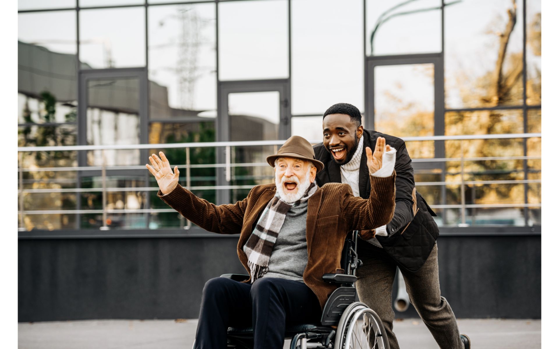 Older man being pushed in wheelchair.