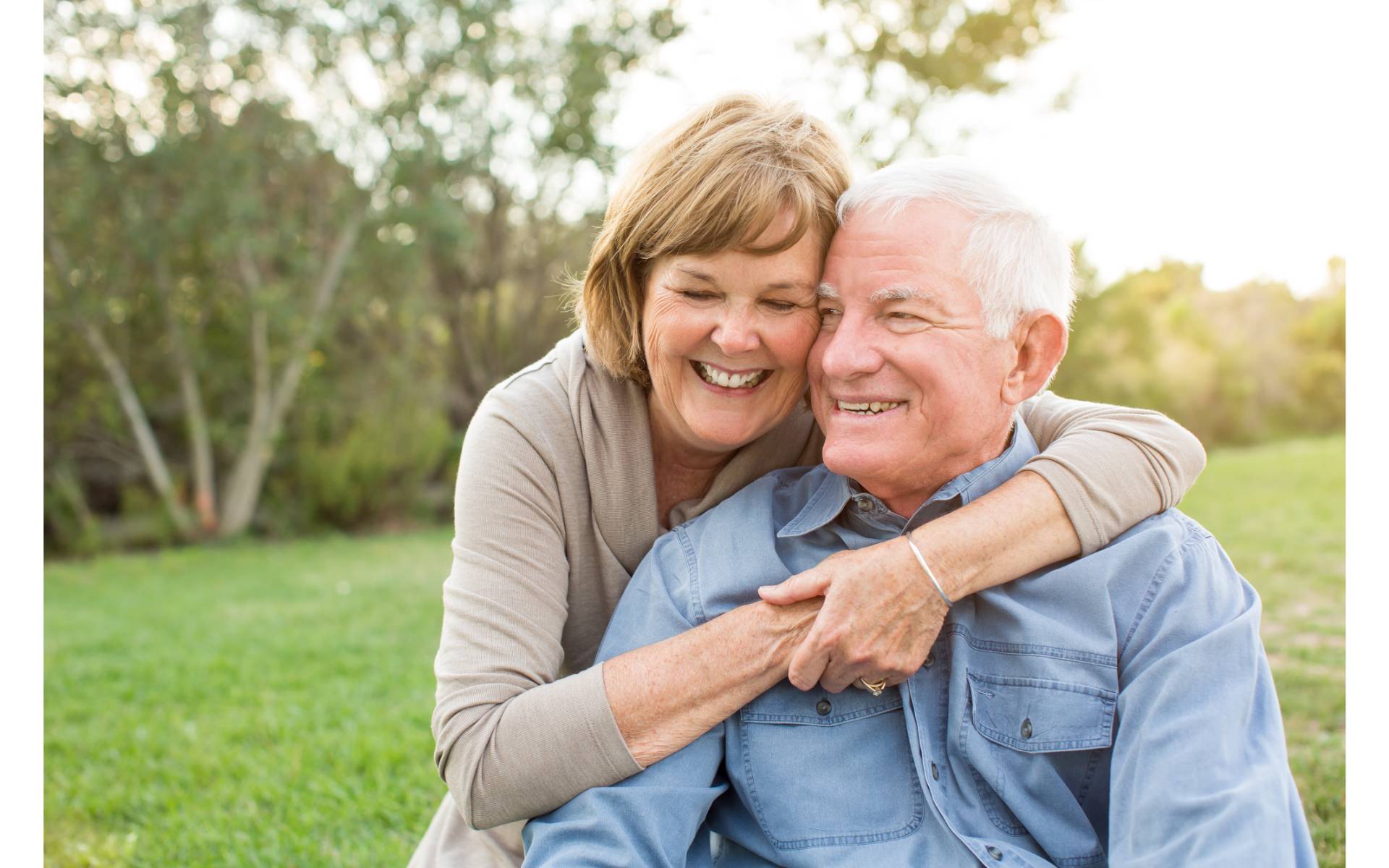 Older couple looking happy while hugging. Cover for article about living with COPD.