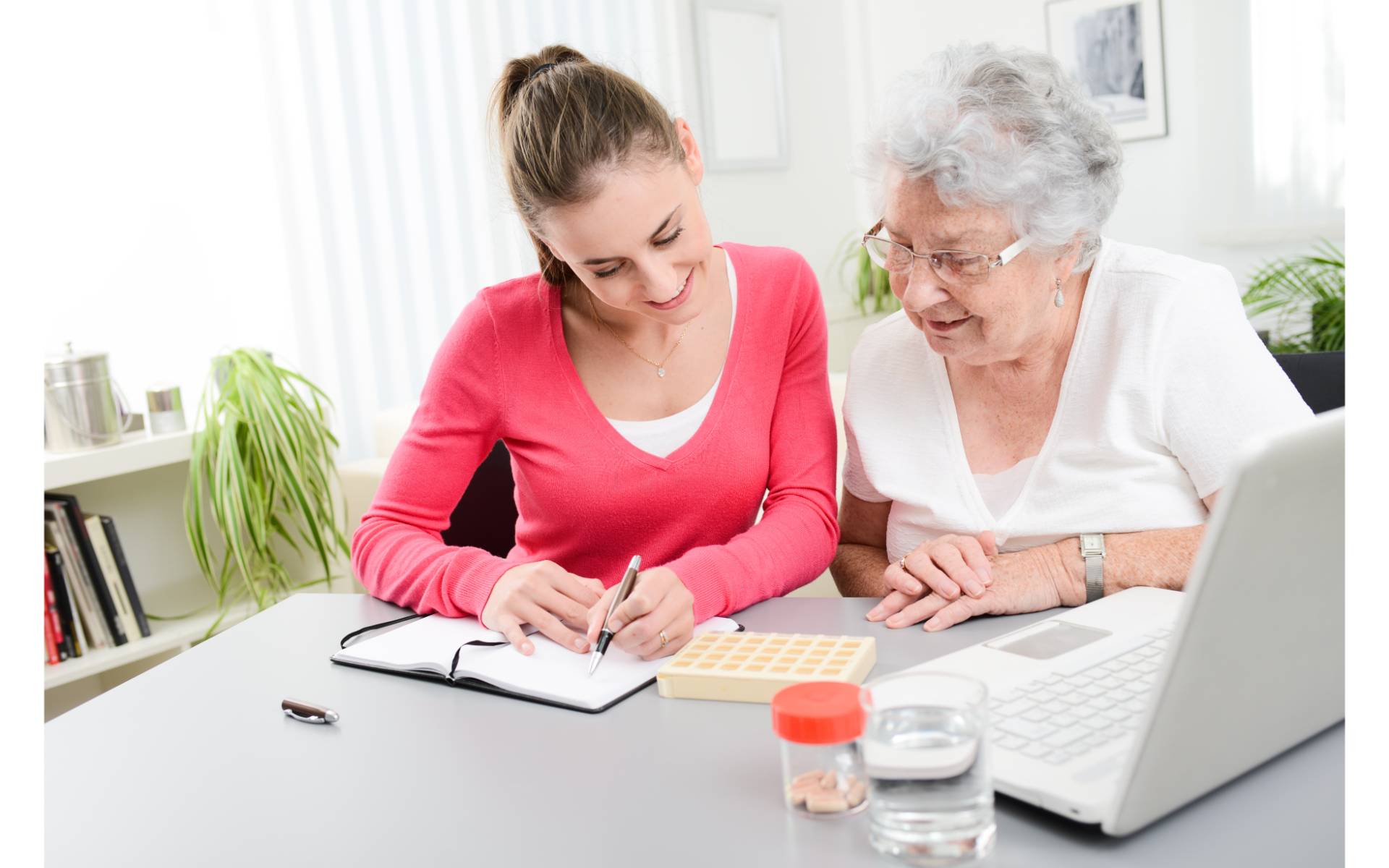 Older woman and younger family member reviewing medication schedule. Cover image for article about medication management.