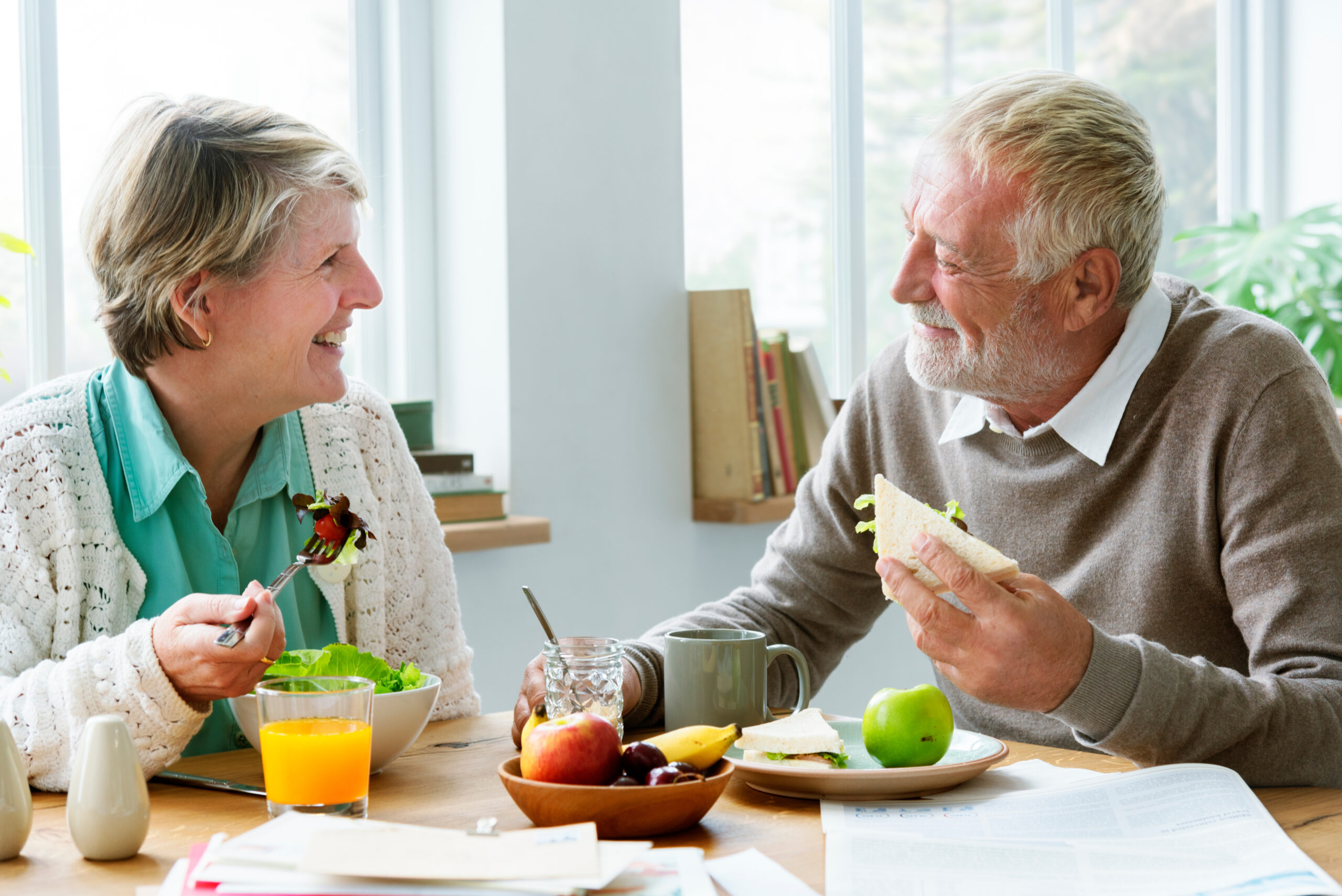 Older couple eating meal fit for proper senior nutrition.