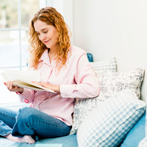 Woman reading book for senior caregivers