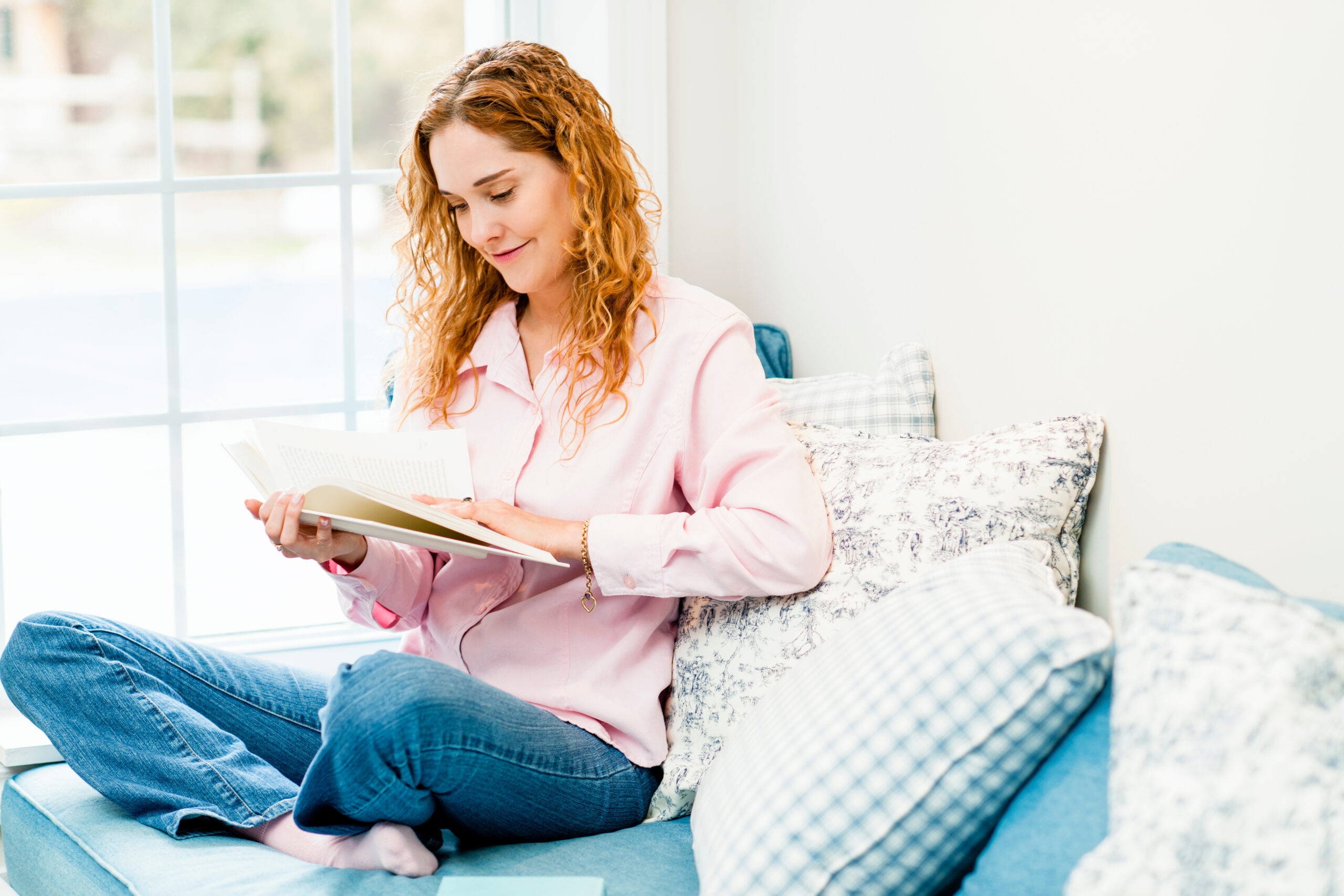 Woman reading book for senior caregivers