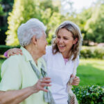 Caregiver talking with senior about the best ways of coping with chronic illness