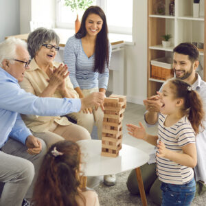 Seniors engaging in social time with family, part of a healthy routine for seniors