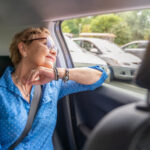 Older woman participating in the top ridesharing programs for seniors