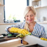 Senior woman organizing her home for aging-in-place